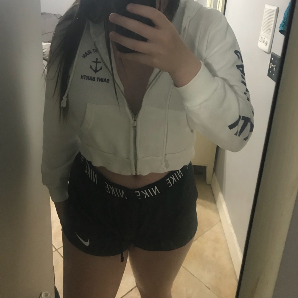 white zip up jacket